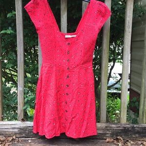 Red floral front button dress.